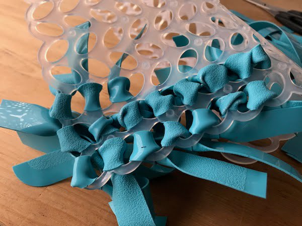 The underside of the silicone snuffle mat as it is being made