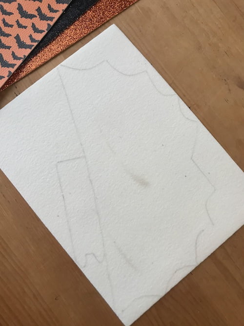 trace the pattern piece onto the back of the fabric to cut it out