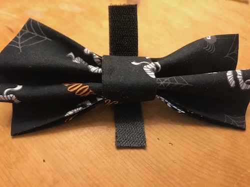 Both the velcro pieces are glued to the back of the loop