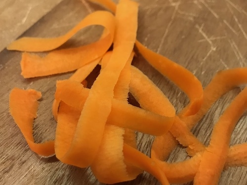 Use a potato peeler to make thin slivers of carrot